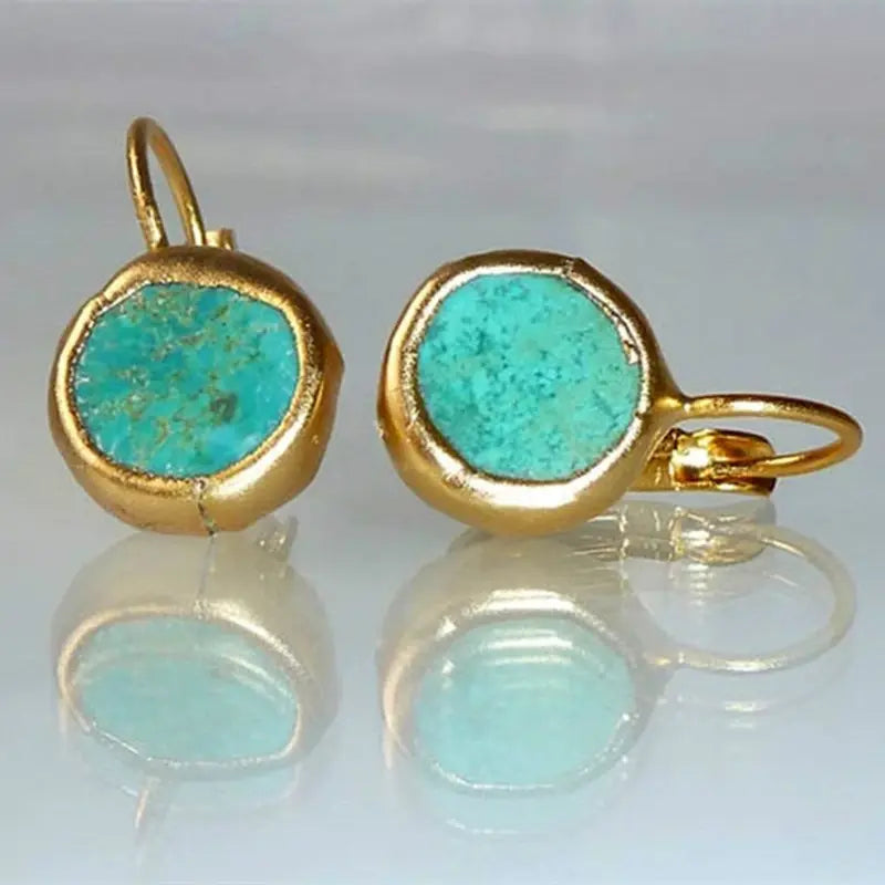 Elegant gold earrings with turquoise stone